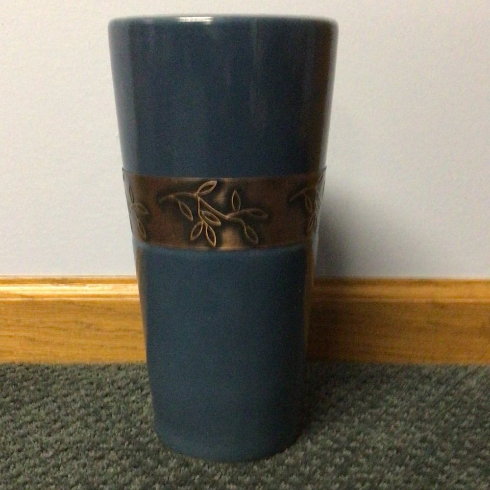 Blue ceramic vase with decorative metal band